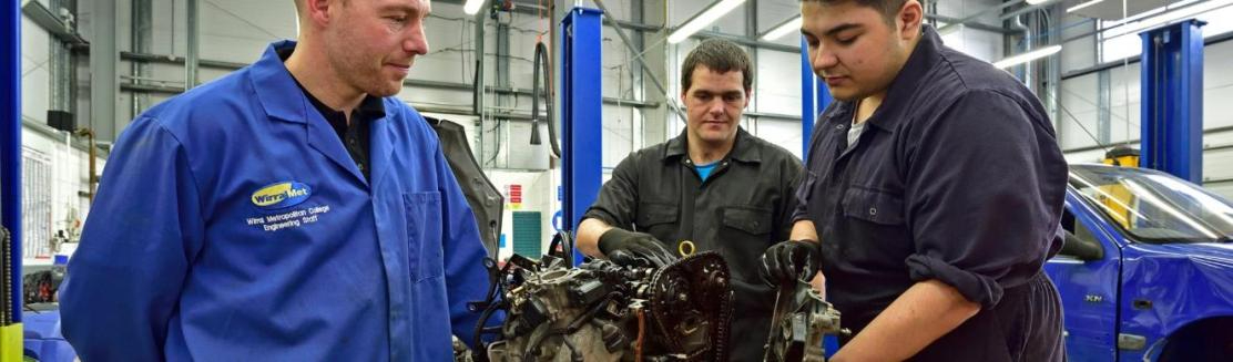 WMC Light Vehicle Maintenance and Repair Principles student being instructed by tutor