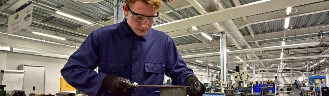 WMC Engineering Diploma student working inside classroom