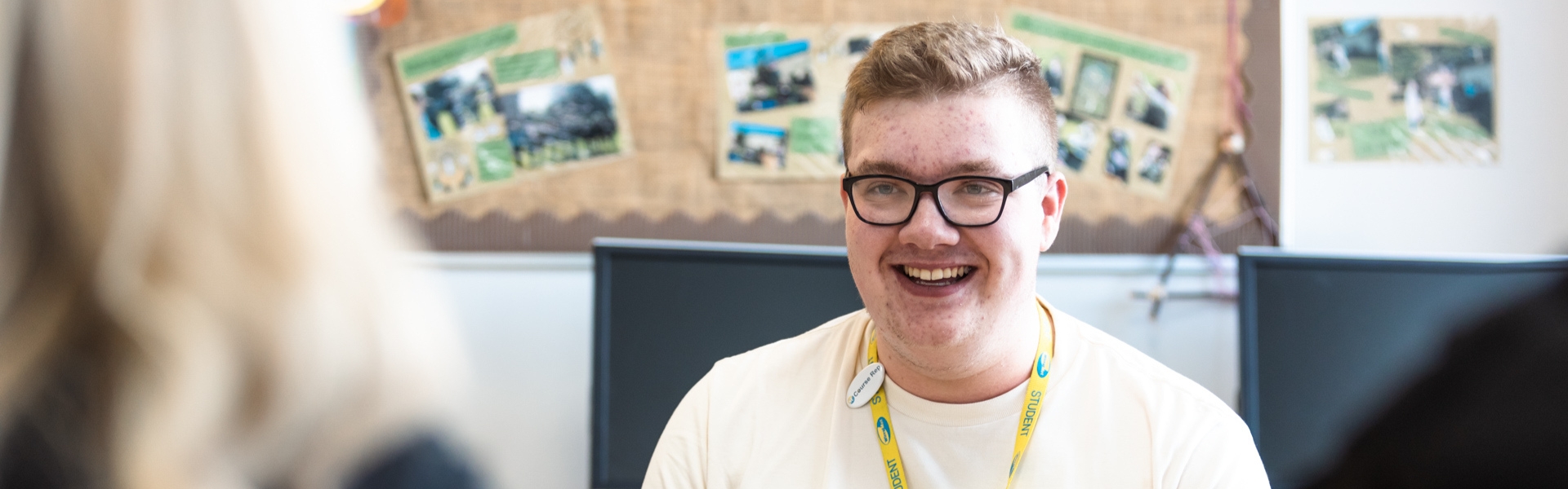 Health and Social Care student sitting inside classroom